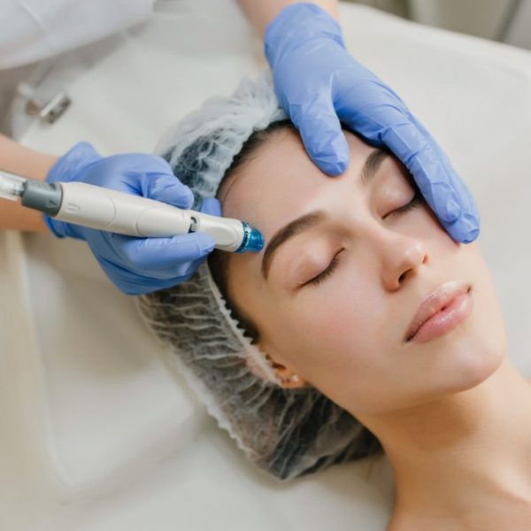 view-from-rejuvenation-beautiful-woman-enjoying-cosmetology-procedures-beauty-salon-dermatology-hands-blue-glows-healthcare-therapy-botox-1-1